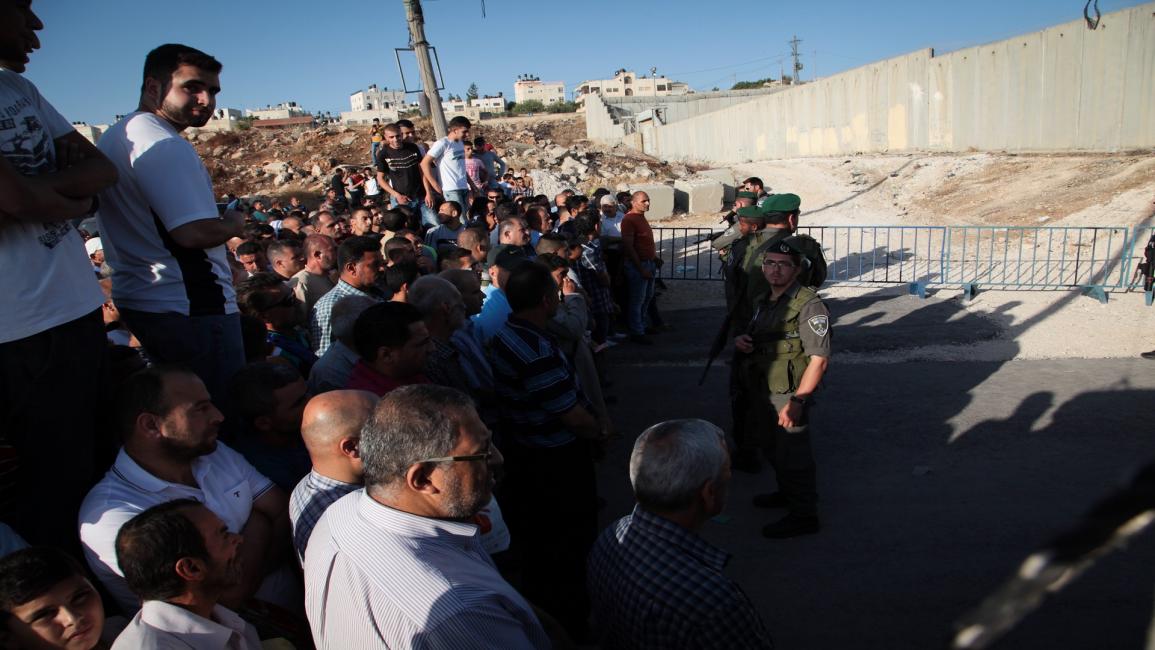فلسطينيون عند معبر قلنديا- Getty