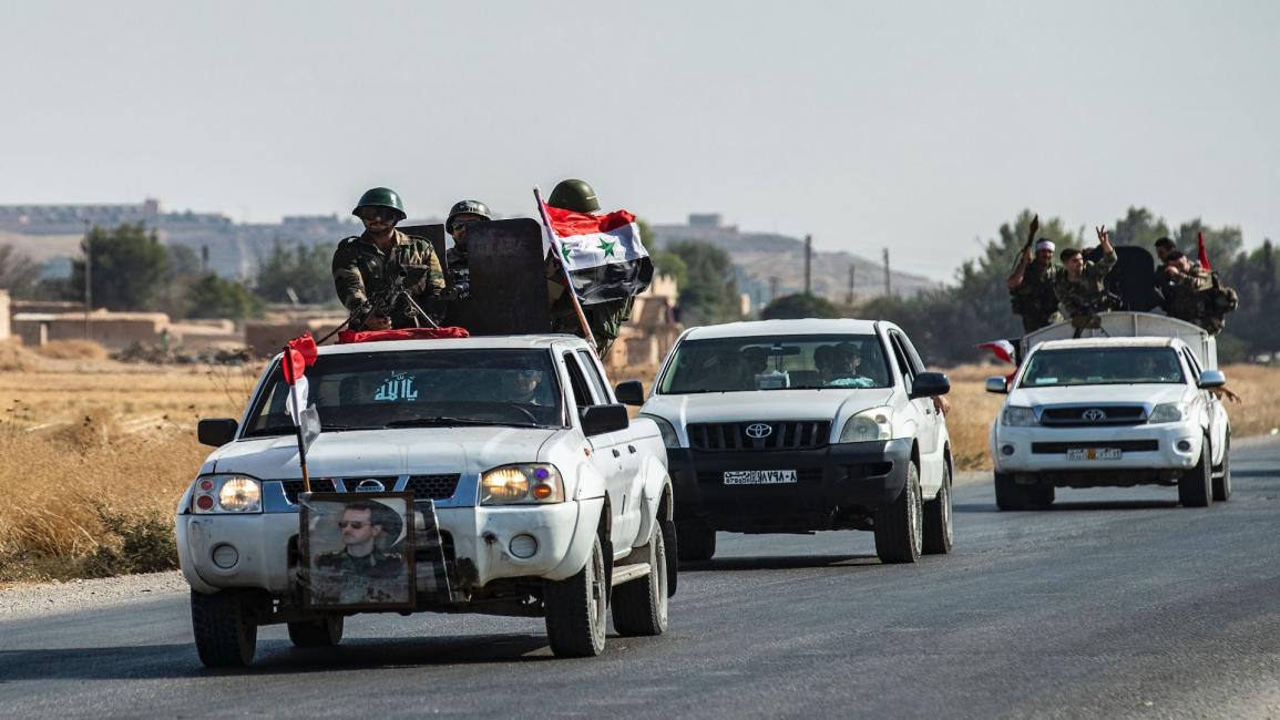 تمركزت قوات النظام السوري بمحيط مدينة منبج (فرانس برس)