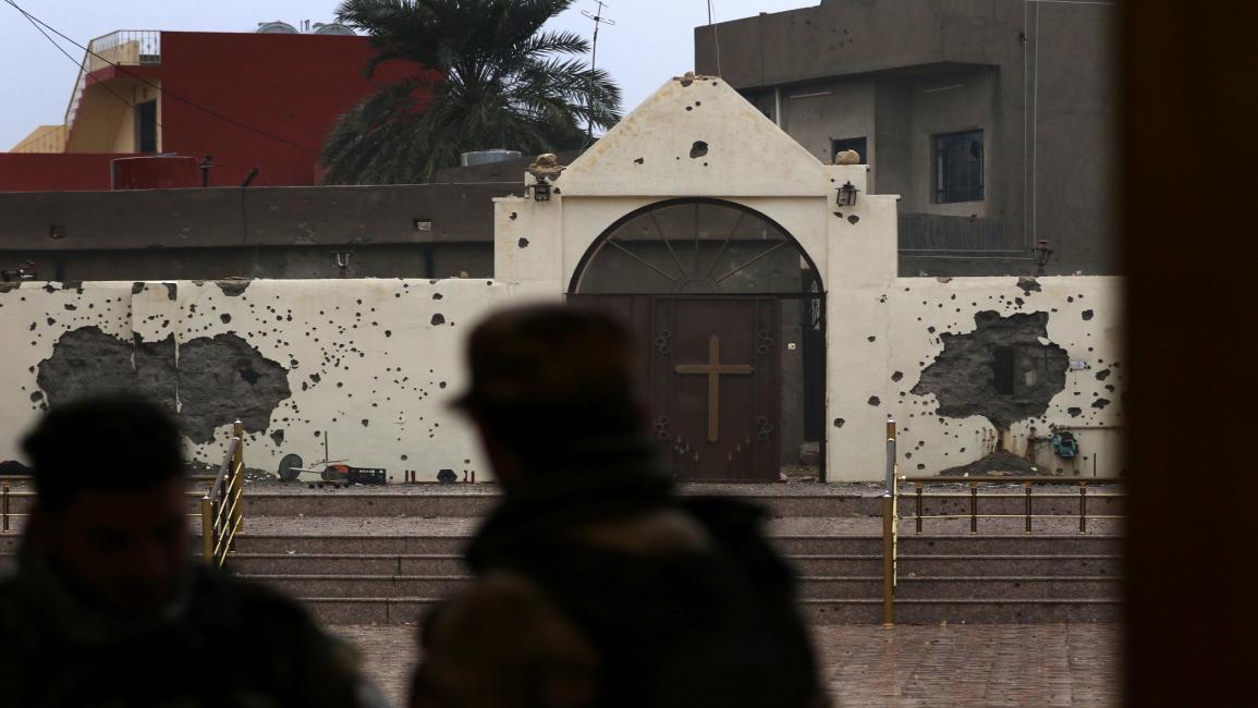 العراق-مجتمع- كنيسة متضررة في الموصل(صفين حامد/فرانس برس)