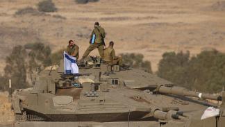 وحدات عسكرية إسرائيلية قرب الحدود اللبنانية 11 أكتوبر 2023 (جلال ماري/فرانس برس)
