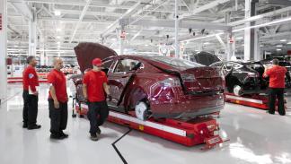 Workmen assemble Model S sedans at the Tesla auto plant in Fremont, Calif. Tuesday, June 12, 2012. Palo Alto-based Tesla Motors is in the final countdown to the launch of its Model S sedan being manufactured at the former NUMMI plant. Tesla plans to have a big customer event and deliver the first Model S on Friday, June 22. (Patrick Tehan/Staff) (Photo by Patrick Tehan/MediaNews Group/Bay Area News via Getty Images)