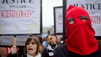 تظاهرة لأتباع الكنيسة بباريس ضد محاكمتها، نوفمبر 2011 (Getty)
