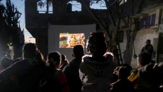 	 تعرض الأفلام في مناطق مختلفة من القطاع (محمود الهمص/ فرانس برس)