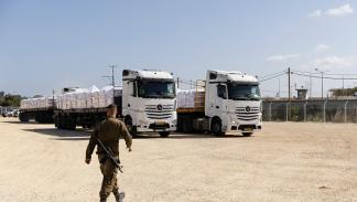 شاحنات المساعدات الإنسانية إلى غزة عند معبر بيت حانون، 5 مايو 2024 (Getty)