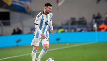 Getty-Lionel Messi of Argentina in action during a match between...