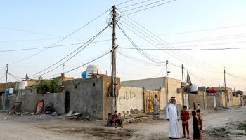 منطقة فقيرة على أطراف مدينة الناصرية في العراق (أسعد نيازي/فرانس برس)
