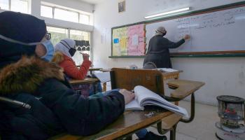 تلاميذ في مدرسة في الأردن وسط كورونا 2 (خليل مزرعاوي/ فرانس برس)