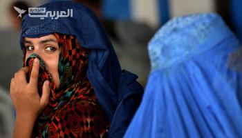 ​  المرأة "طالبان" تفرض البرقع على النساء في الأماكن العامة  ​