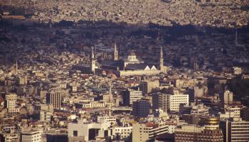 مشهدٌ عام لدمشق يتوسّطها المسجد الأموي - القسم الثقافي