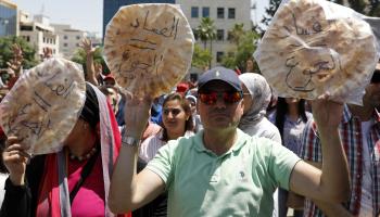 تظاهرة مناهضة للتقشف أمام اتحاد نقابات عمال الأردن فرانس برس
