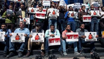 من وقفة احتجاجية للصحافيين والمصورين المصريين عام 2014 (محمود خالد/فرانس برس)