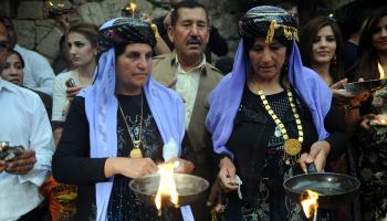 احتفال وأيزيديون في العراق (إدريس أوكودوجو/ الأناضول)