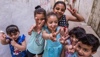 أطفال في مخيم بالقرب من مدينة رام الله بالضفة الغربية (getty)