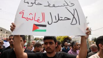 خلال تظاهرة ضد تزايد الجرائم في يافا، يونيو الماضي (أحمد غرابلي/فرانس برس)