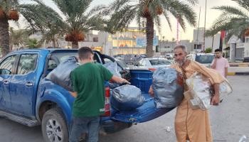 تواصلت أزمات توزيع المساعدات في درنة (محمود تركية/ فرانس برس)