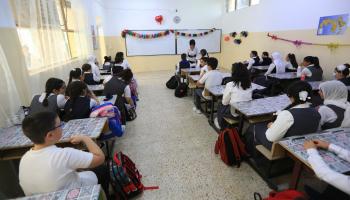 تلاميذ في مدرسة في العراق (مرتضى السوداني/ الأناضول)
