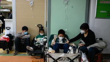 أطفال مصابون بأمراض تنفسية في الصين (جاد غاو/ فرانس برس)