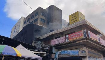 إحراق محلات تجارية في رام الله، في 30 مايو 2024 (العربي الجديد)