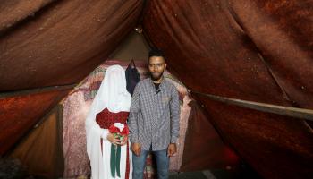 زفاف محمود وشيماء خزيق في مخيمات غزة (الأناضول)