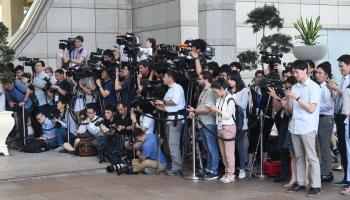صحافيون لتغطية قمة سنغافورة ROSLAN RAHMAN/AFP