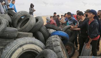 جمع الإطارات في غزة لجمعة الكوشوك (عبدالحكيم أبو رياش)