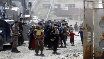 العراق/سياسة/مدنيون في الموصل/(كريم صحيب/فرانس برس)