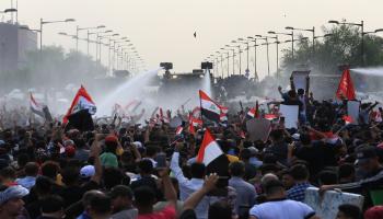 تظاهرات العراق (مرتضى سوداني/الأناضول/Getty)