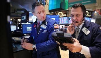 Traders work  New York Stock Exchange