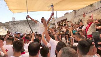 مسيحيو فلسطين يحتفلون بسبت النور(العربي الجديد)