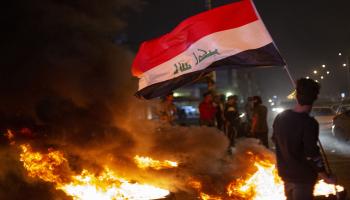 مظاهرات ليلية في العراق (حسين فالح/فرانس برس)