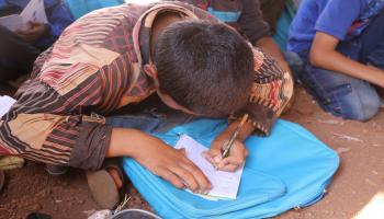 تلميذ سوري في خيمة- الأناضول