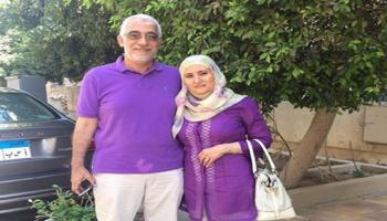 علا القرضاوي وزوجها حسام خلف (فيسبوك)