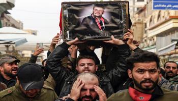خلال جنازة المصور العراقي أحمد المهنا (حيدر حمداني/فرانس برس)