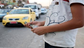 طفل عراقي يتسول(وليد الخالد/فرانس برس)