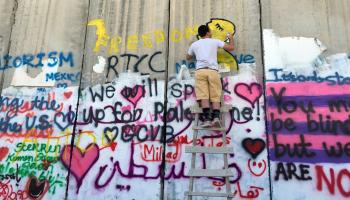 فلسطين جدار الفصل (توماس كوكس/فرانس برس)