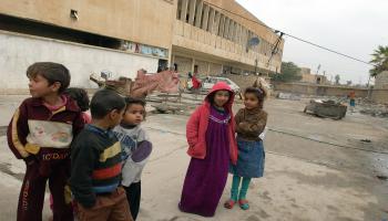 مشردون في بغداد(ماركو دي لورو/Getty)