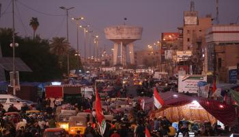 مظاهرات ساحة التحرير في العراق (مرتضى سوداني/الأناضول)