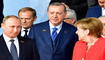 أنجيلا ميركل وفلاديمير بوتين ورجب طيب أردوغان/Getty