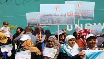 نساء يطالبن يإعمار غزة(عبد الحكيم أبو رياش)