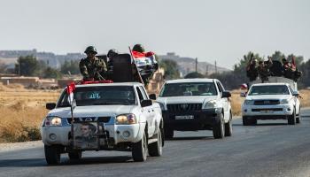 تمركزت قوات النظام السوري بمحيط مدينة منبج (فرانس برس)