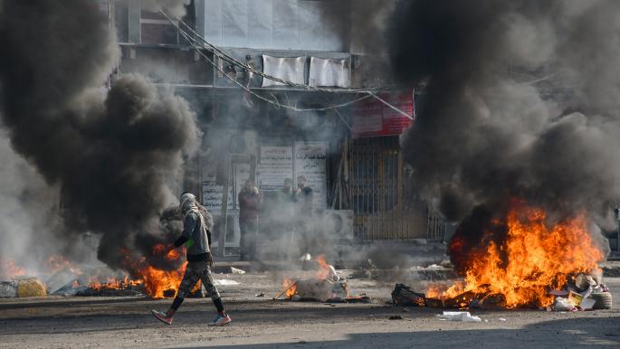 العراق: استهداف ناشط وانتشار أمني بالناصرية ودعوات لتجدد الاحتجاجات