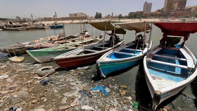 انحسار مياه دجلة تسبب في تراجع الصيد (أحمد الربيعي/ فرانس برس)