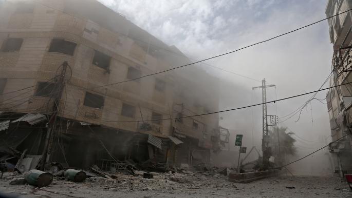 قصف متواصل في الغوطة الشرقية (عبد المنعم عصام/فرانس برس)