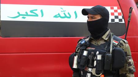 أحد عناصر الأمن العراقي (أحمد الربيعي/ فرانس برس)