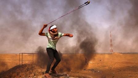 مواجهات مع الاحتلال الإسرائيلي بغزة (سعيد خطيب/ فرانس برس)