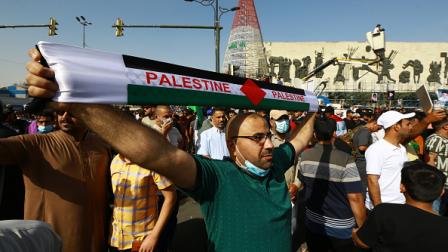 مظاهرة سابقة دعماً لفلسطين بالعراق (مرتضى السوداني/ الأناضول)