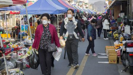 Visitors wear mask and shopping around traditional market place in Sangju, South Korea. South Korea's new coronavirus cases spiked to almost 200 Friday, the highest in 70 days, as sporadic cluster infections from informal gatherings continued to pop up across the nation, forcing health authorities to consider raising the social distancing scheme. (Photo by Seung-il Ryu/NurPhoto via Getty Images)