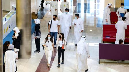 طلاب كويتيون وسط كورونا في الكويت (ياسر الزيات/ فرانس برس)