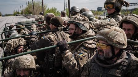 جنود أوكرانيين (ياسويوشي شيبا/ فرانس برس)