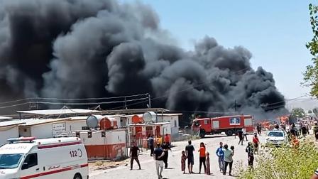 حريق في مخيم نازحين في دهوك في إقليم كردستان العراق (فيسبوك)